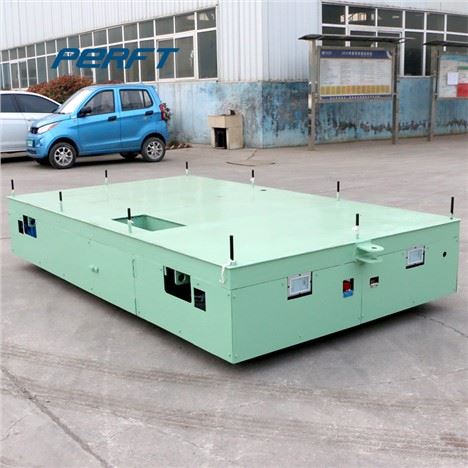 Carro de transferencia de material sin rieles